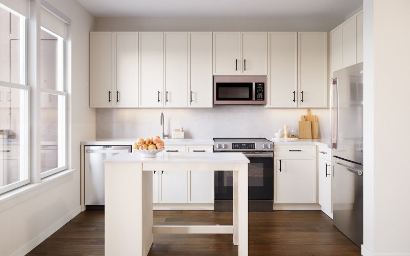 a kitchen with white cabinets