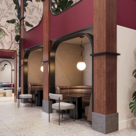 a clubroom with tables, chairs and plants